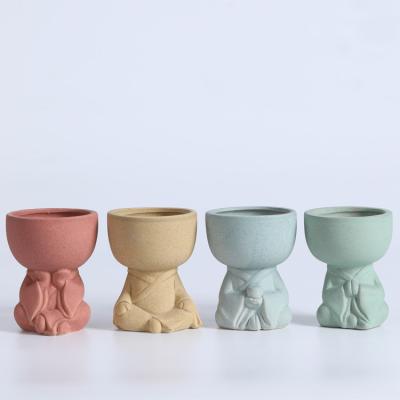 China Mini Succulent Flower Pots Cute Small Modern Ceramic Planter Buddha for sale