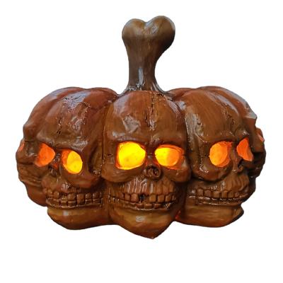 China Halloween American Creative Resin Skull Statue Multi Faceted Skeleton Pumpkin Lamps for sale