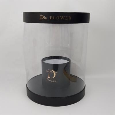 China Handmade Luxury Round PVC Flower Box Cylinder Transparent Roses Packaging Gift Box With Logo for sale