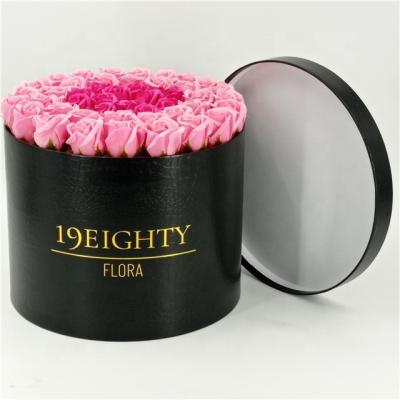 China Handmade custom logo stamping leather rose box, leather flower box, leather round box for sale