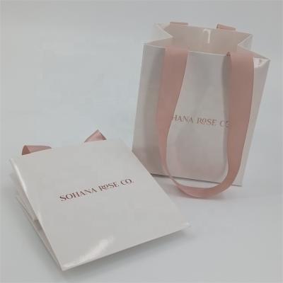 China Handmade Custom Luxury Shopping Bags Gift Paper Bags Packaging Bags With Logo for sale