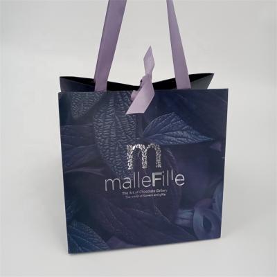 China Fashion Handmade Luxury Paper Bag Custom Design For Gift Packaging With Ribbon Closure for sale