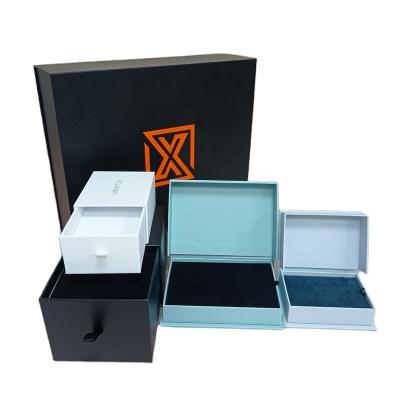 China Dongguan Handmade Factory Customized Luxury Cotton Filled Small Logo Velvet Jewelry Box Packaging And Bag for sale