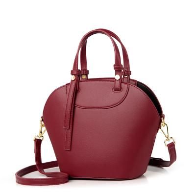 China 2022 fashion new texture handbag shell large capacity simple wear-resistant material handbag for sale