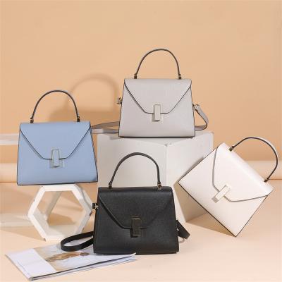 China Customizable factory sales hot trending wholesale ladies handbags fashion logo vegan leather handbags for sale