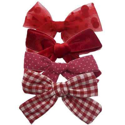 China Hair accessory set of 4 red bow hair clips for sale