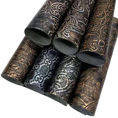 China Abrasion-resistant classic pattern embossing retro old style PU leatherette fabric roll for making cover/decoration/belt/accessories for sale