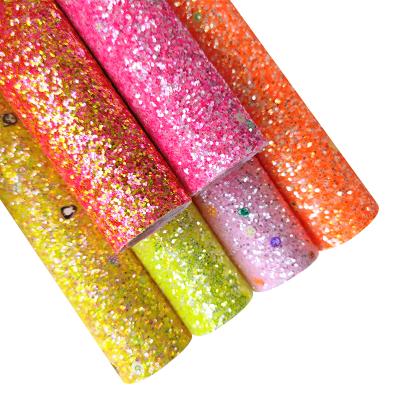 China Candy Flower Design Chunky Glitter Faux Leather Fabric Elastic Fluorescent Sequins For Making Bag Hair Bow for sale