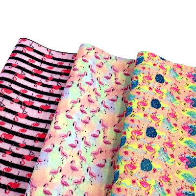 China Anti-rust Wholesale Colorful Flamingos Printed Fine Powder Glitter Leatherette Fabric For Making Wallet Bag Hairbow Decoration for sale