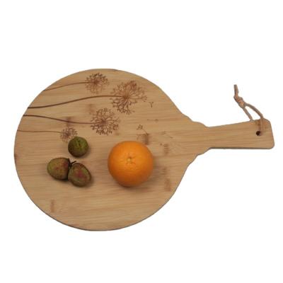 China Viable Bamboo Flower Carving Cutting Board Bamboo Cutting Board Pizza Log Cutting Board Wholesale for sale