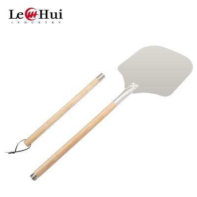 Cina Large Aluminum Pizza Stored Turning Skin With Wood Handle Pizza Transfer Tools Kitchen Pizza Baking Shovel With Detachable Handle in vendita