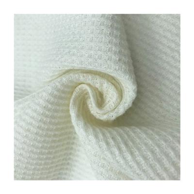 China TC Shrink-resistant 170gsm self-delivery knitted stretch dyed waffle polyester elastic cotton fabric for skirt for sale