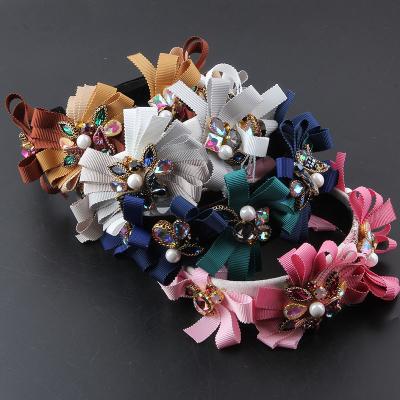 China New fashion non-slip fabric pastoral headdress style bow inlaid rhinestone colorful hair circle ladies party hair travel hair accessories 76 for sale