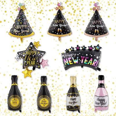 China Happy New Year gift toy 2022 en forma botellas Feliz Ano Nuevo de fiestas de Para de globos wine bottle champagne shooting star foil balloon for sale