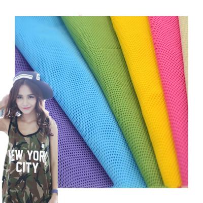 Cina soft 100% polyester mesh fabric for garment girl dress sportswear in vendita