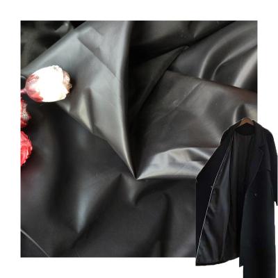 China Cire finish 190T 210T poly taffeta waterproof printed jacket coat man suit lining fabric for sale