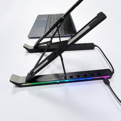 China (Size) 2022 Adjustable New Hot Selling Portable Ultrathin Foldable Desktop Stand Heat Dissipation Tablet Laptop Stand for sale