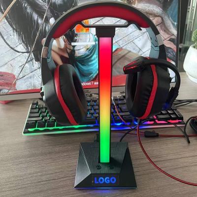 China Multifunctional Pickup Rhythm RGB Light Effect Earphone Bracket with USB Jack, Earphone Jack, Type-C Smart RGB Jack Earphone Bracket Game for sale