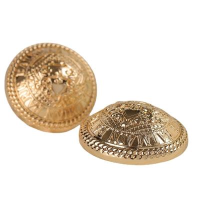 China Custom Gold Embossed Dome Metal Logo Washable Around Sewing Leg Buttons For Clothing Costume for sale