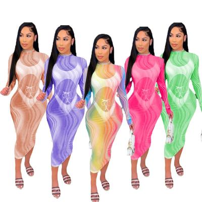 China Colorful printing long sleeve women anti-static sexy stretch neck gauze o maxis transparent nightclub trend casual wear for sale