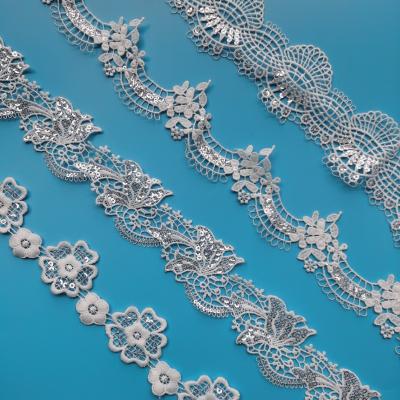 China New DIY milk silk yarn embroidery lace barcode lace flower finial edge water-soluble white water-soluble clothing accessories for sale