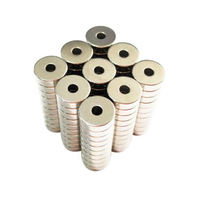 China Industrial Magnet China Manufacturer N52 Neodymium Round Magnets With Holes for sale