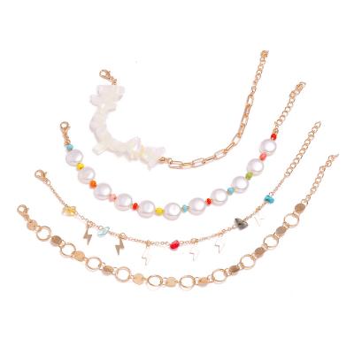 China Handmade Summer Beach Bead Disc Natural Gravel Foot Ornaments Four-piece Costume Multilayer Anklet Chain for sale