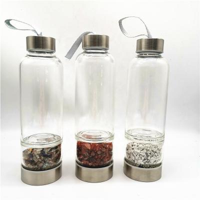 China Viable Natural Healing Glass Quartz Crystal Elixir Water Bottle With Crystal Inside for sale