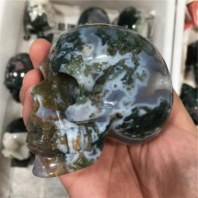 China Europe Wholesale Customize Hand Carved Natural Moss Agate Quartz Crystal Skulls With Druzy for sale