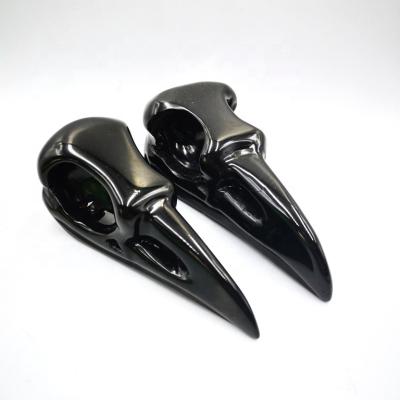 China Wholesale High Quality Natural Black Obsidian Crystal Stone Crow Skulls Animal From Europe Carved Crystal Skulls for sale