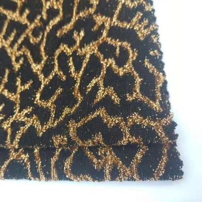 China New design fancy metallic yarn stretch nylon jacquard spandex knit swimwear fabric supplier for sale