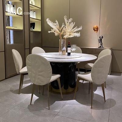 China (Other)Adjustable Leather Dining Chair Dining Chairs Modern Luxury Dining Room Furniture Table Set 8 Chairs for sale