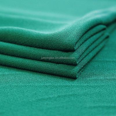 China Anti-Static Elastic Satin Twist Stain Fabric Soft High Strap 50D Satin Robe Pajamas Shirt Fabric for sale