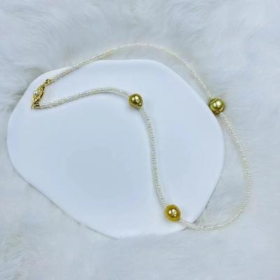 China Natural Freshwater Pearl Gold Seawater Pearl 3mm Keshi Pearl Necklace for sale