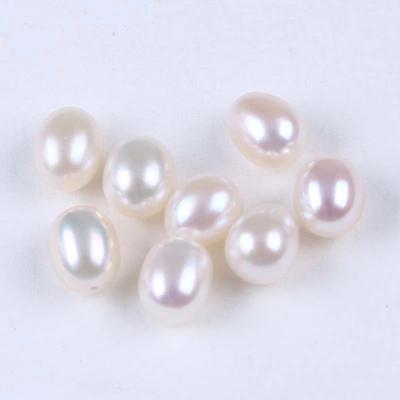 China Pearl AAA 7-7.5mm White Half-drilled Freshwater Rice Pearl Freshwater Pearl Beads for sale