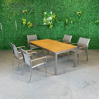 China Modern Wholesale Teak Wood Top Outdoor Table Long Set Stainless Steel Frame Dining Table And Chairs Waterproof Mesh Fabric Armchair for sale