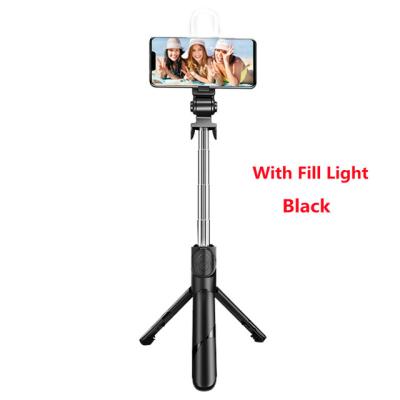 China Fold 2021 NEW Selfie Stick Wireless Mini Tripod Extendable Monopod with Fill Light Remote Shutter for IOS Android Phone for sale