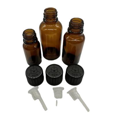 China Child-Proof 18mm black orifice reducer child proof essential oil cap for euro bottles for sale