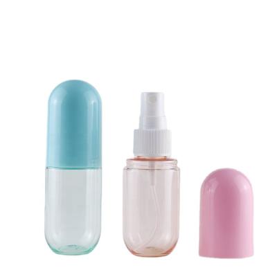 China Atomize perfume 40ml Portable lotion bottle pill shape capsule spray pump bottle for sale