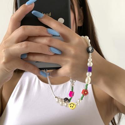 China 2022 Fashion Jewelry Rainbow Fruit Smile Face Style Mobile Phone Chains Beads Anti-lost Women Phone Strap Phone Charms for sale