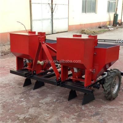 China Planting Ginger Seeder Planter Tractor Mounted Potato Ginger for sale