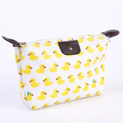 China WOBAG High Quality Fashion Hot Cosmetic Bags Flower Print Dumpling Large Makeup Bag For Women for sale