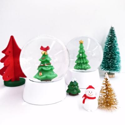 China Europe Christmas Tree Ornaments Christmas Decoration Sale Resin Snow Globe With Snowflake for sale