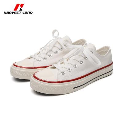 China Spring Summer Fashion Trend Hot Selling Shoes Comfortable Classic Style Flat Sneakers White Vulcanized Canvas for sale