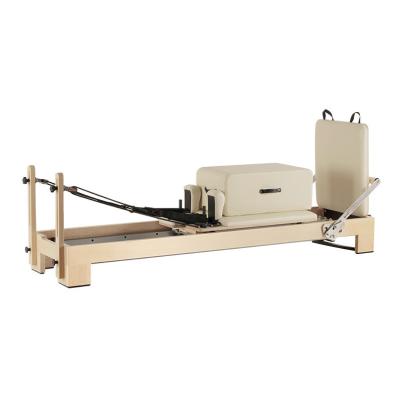 China Durable Home White Maple Pilates Reformer Machine For Sale Core Training Bed With Foldable Yoga Exercise for sale