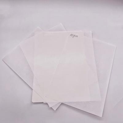 China 30gsm-80gsm Food Grade Anticurl Food Wrapping Paper White MG Kraft Paper for sale