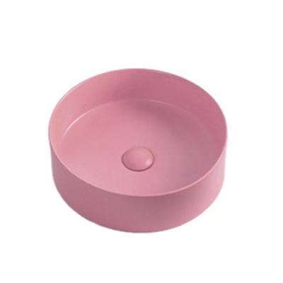 China Bathroom Sink Matte Pink Color Circle Hand Wash Basin NEW Fashion Eco-friendly Hot Sale Countertop Sinks Ceramic Bathroom Daily Commodities for sale