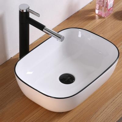 China Luxury Line Rectangular Ceramic Bathroom Black Light Eco-Friendly Porcelain Countertop Color Hand Wash Basin Hotel Sink for sale