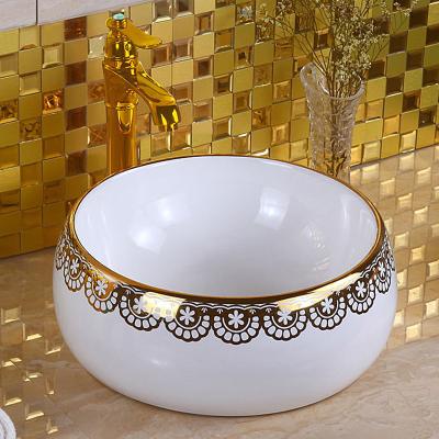 China Eco-friendly Modern Gold Plated Round Oval Ceramic Hand Wash Countertops Wash Basin Sinks Home Bathroom Villa Hotel for sale