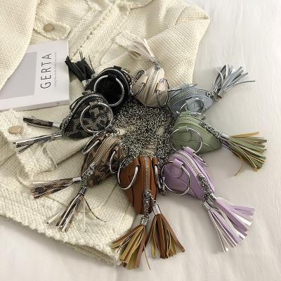 China Fashion Portable Wholesale Girls Small Tassel Coin Purses Ladies Shoulder Sling Luxury Women's Mini Bags for sale